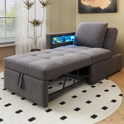 A gray sofa bed with a tufted seat and a built-in LED light strip is shown in a room setting.