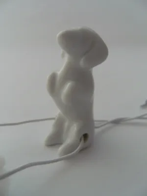 Produktbild von Porzellan Tropfenfänger Hund, Dackel, weiß, für Kaffee- oder Teekannen, Tier Hunde
