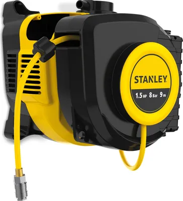 A Stanley air compressor mounted on a wall.
