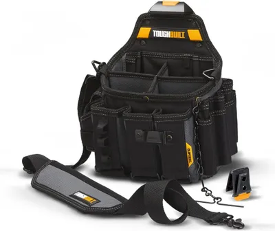 A professional studio shot of a tool bag with its shoulder strap and a clip accessory, set against a white background.