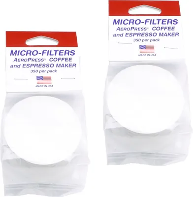 Two packages of round coffee filters are shown side-by-side against a white background.