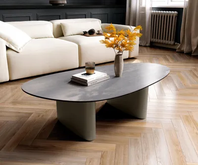 Produktbild von DELIFE Couchtisch Edge Oval 140x75 cm Keramik Beton Grau Ovada Effektfinish Titan