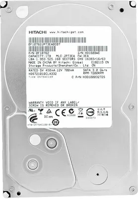 The image shows the top view of a Hitachi hard disk drive with its label clearly visible.