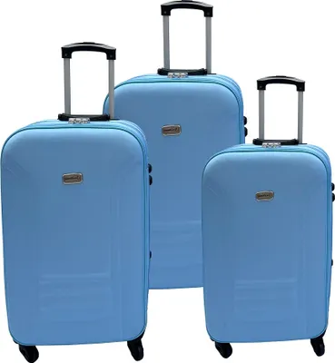 Three blue suitcases of different sizes are arranged in a group against a white background.