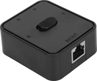 A black network switch with labels and a slider.