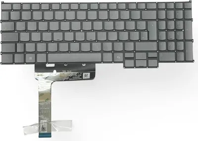 A keyboard with a ribbon cable attached, isolated on a white background.