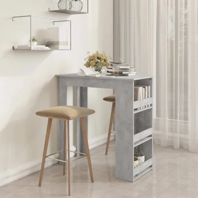 A bar table and stools in a room with shelves and curtains.