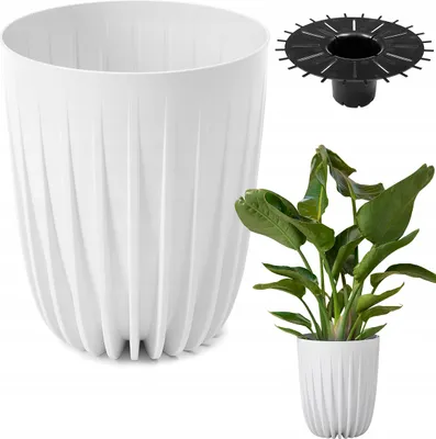 A white planter with a decorative ribbed texture is shown next to a small potted plant and a black drainage insert.