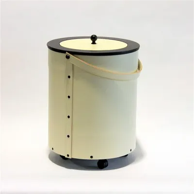 A beige and black cylindrical basket with a lid and handle, shown on a white background.