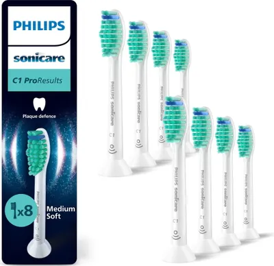 A product shot of Philips Sonicare toothbrush heads in their packaging and loose.