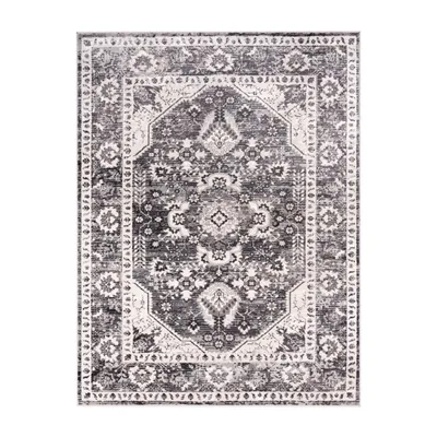 A rectangular rug with a traditional Moroccan design is shown flat against a white background.