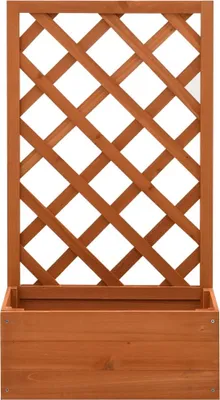 A wooden planter box with a lattice trellis attached.