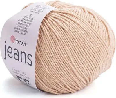 A ball of beige yarn with a label.