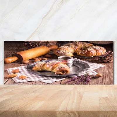 Produktbild von Tulup® Küchenrückwand Spritzschutz aus Glas -125x50 -Spritzschutz auf gehärtetes Glas Deko Essen & Getränke Croissants