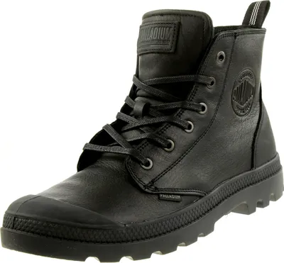 A black leather Palladium boot is shown against a white background.