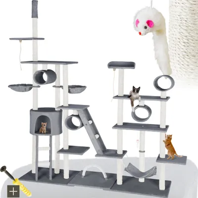 A multi-level cat tree with various platforms, perches, tunnels, and toys, featuring two cats interacting with the structure.