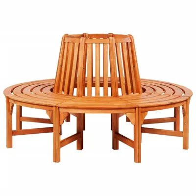 A wooden bench designed to surround a tree.