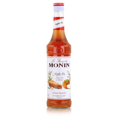 A bottle of Monin Apple Pie syrup against a white background.