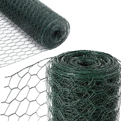 Two rolls of green hexagonal wire mesh fencing are shown against a white background. One roll is in the foreground, partially unrolled, showing the hexagonal pattern. The other roll is in the background, lying on its side.