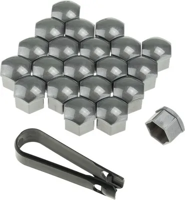 A collection of gray lug nut caps and a tool for applying them, arranged on a white background.
