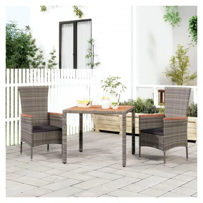 Produktbild von Robuster Gartentisch aus Akazienholz und Poly Rattan, wetterfest, in Grau