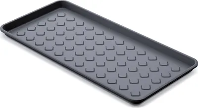 A gray shoe tray with a textured surface.