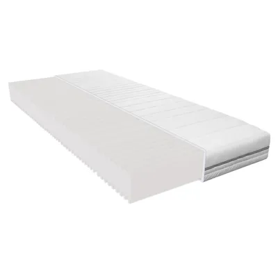 A white mattress shown from a diagonal angle.