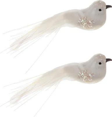 Two white decorative birds with glitter accents and long tail feathers, isolated on a white background.