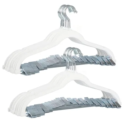 Two stacks of white hangers with silver clips, displayed against a white background.
