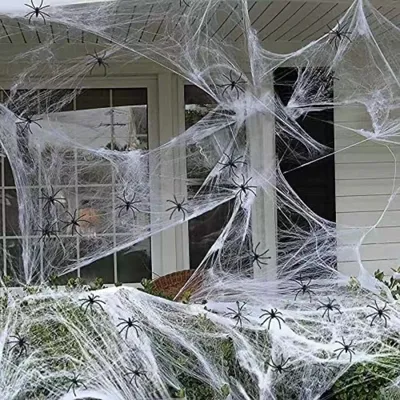 Produktbild von PRECORN leuchtendes realistisches Spinnennetz-Set mit 20 Spinnen - Deko für gruselige Atmosphäre innen & außen für Halloween, Fasching Mottopartys