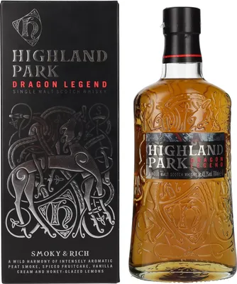 A bottle of Highland Park Dragon Legend single malt Scotch whisky and its packaging are displayed side-by-side against a white background.
