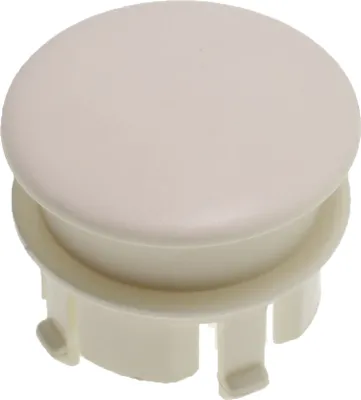 A close-up studio shot of a white plastic cap with a slightly raised, rounded top and a flanged base with four tabs.