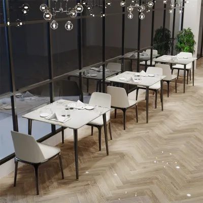 Interior of a restaurant with tables and chairs.