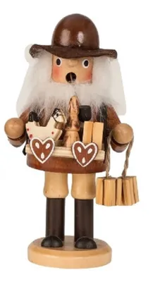 Räuchermännchen Händler mit Bauchladen, trägt einen braunen Hut und einen langen weißen Bart.