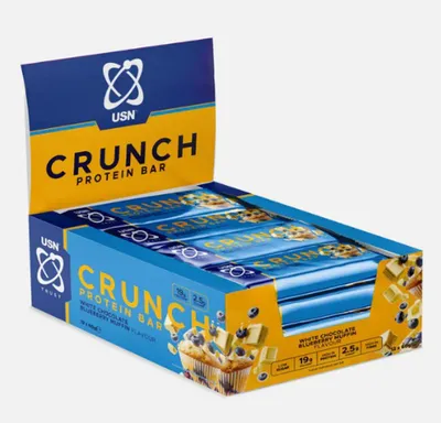 Produktbild von USN Trust Crunch High Protein Bar - 12 Riegel a 60 g White Chocolate Blueberry Muffin