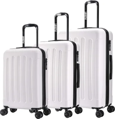 Three white suitcases of varying sizes are arranged side-by-side on a white background.