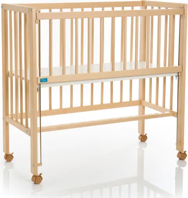 A wooden crib with wheels on a white background.