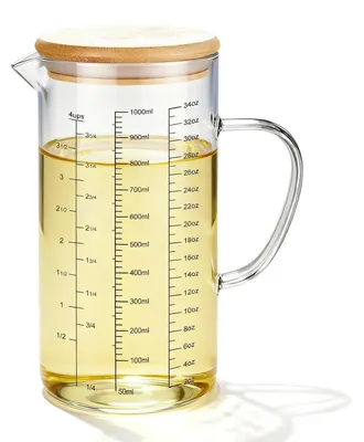 Image de Verre gradué en verre borosilicaté, capacité 1 litre, résistant à la chaleur, avec poignée, graduation et couvercle