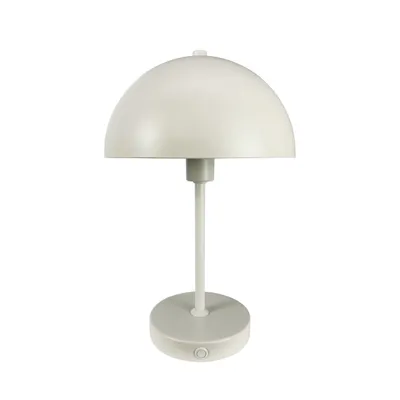 A white table lamp with a dome-shaped shade and a circular base.