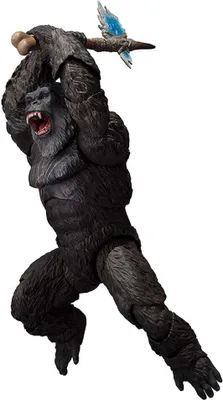 A toy action figure of King Kong holding an axe.