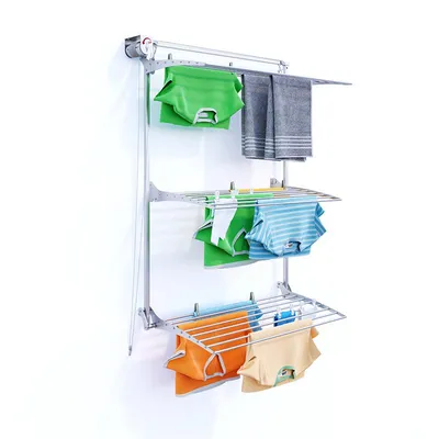 A wall-mounted drying rack with clothes hanging on it.