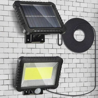 Produktbild von Solar Wandlampe mit Bewegungssensor - Energieeffiziente Außenbeleuchtung - 100 LED's - Intelligenter Sensorlichtmechanismus