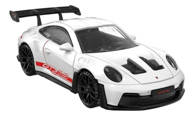 A white Porsche 911 GT3 RS toy car is shown from a slightly elevated side angle against a white background.