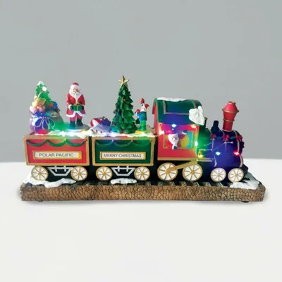Immagine prodotto di ACA Lighting LED RGB decorazione treno con albero rotante e babbo natale con musica 220-240V/ 3AA batteria 38x10x18cm X0317