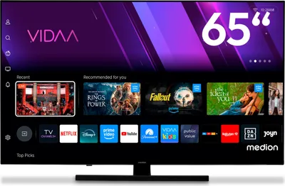 A television screen displaying a smart TV interface with various app icons and content recommendations.