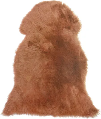 A single, light brown sheepskin rug is shown against a white background.