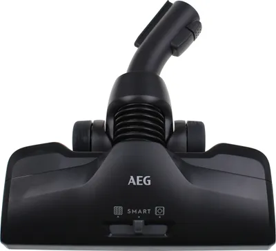 A close-up studio shot of a black vacuum cleaner brush head.