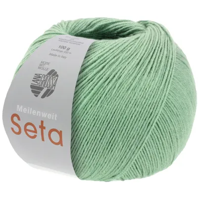 A ball of green yarn with a label.