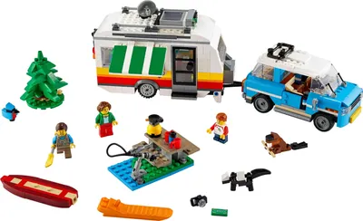 A LEGO set featuring a car towing a caravan, with accessories and minifigures.