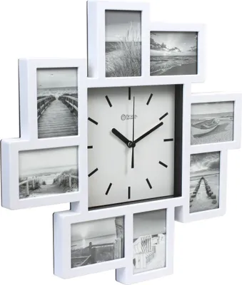 A white photo frame clock with multiple picture frames arranged around a central clock face.